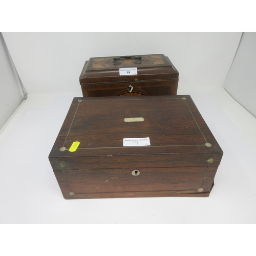 19 - A Georgian mahogany Tea Caddy of sarcophagus shape with satinwood medallion and fan inlay on ogee fe... 