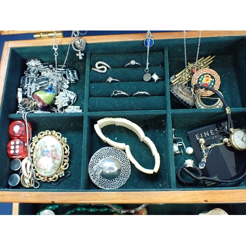 192 - Wooden Chest containing silver Rings, Brooches, Agate necklaces, Chains etc