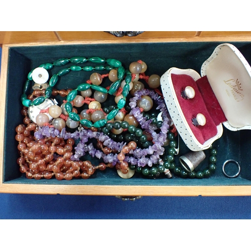 192 - Wooden Chest containing silver Rings, Brooches, Agate necklaces, Chains etc