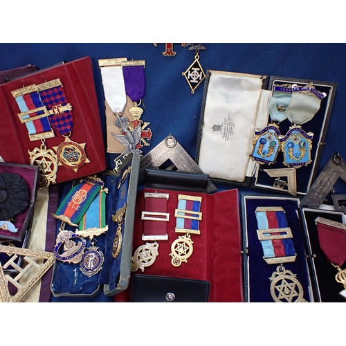 216 - A collection of Masonic Medals, Squares etc many silver and silver gilt