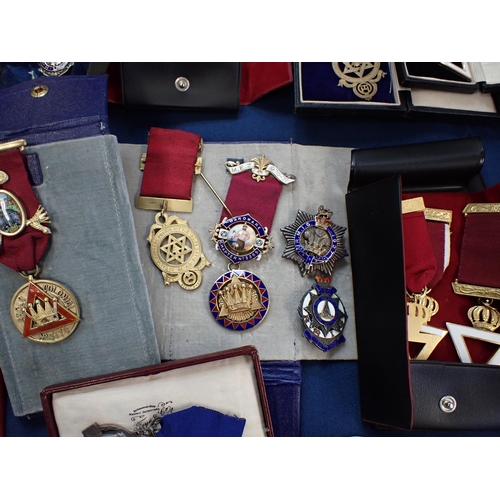 216 - A collection of Masonic Medals, Squares etc many silver and silver gilt