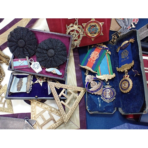 216 - A collection of Masonic Medals, Squares etc many silver and silver gilt