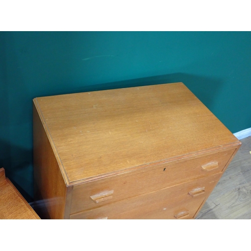 242 - A G-Plan style oak veneered Chest of four drawers and a Dressing Chest