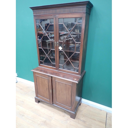 244 - A Georgian mahogany Bookcase fitted pair of astragal glazed doors enclosing adjustable shelves above... 