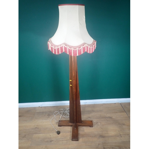 250 - A hardwood Standard Lamp and shade, failed PAT