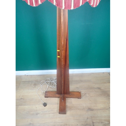 250 - A hardwood Standard Lamp and shade, failed PAT