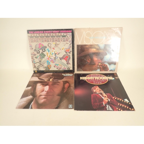 265 - Over 100 12 inch Albums, mainly Rock and Country. Artists include Buddy Holly, Johnny Cash, Judge Dr... 