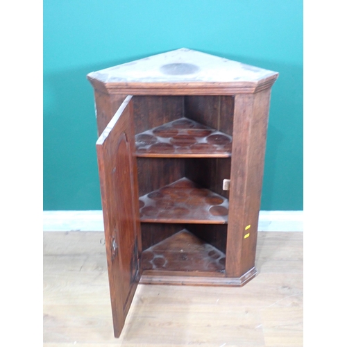 277 - A 19th Century oak hanging Corner Cupboard 2ft 11in H x 2ft 2in W