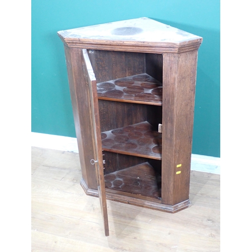 277 - A 19th Century oak hanging Corner Cupboard 2ft 11in H x 2ft 2in W