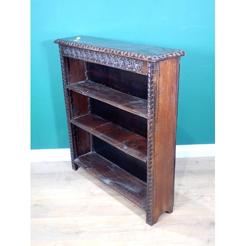 282 - A carved oak open Bookcase with adjustable shelves 3ft 3in H x 2ft 11in W