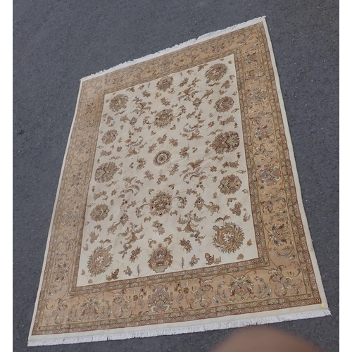 3 - A Persian Carpet with bordered design having stylised floral sprays on a beige ground, 10ft 1in x 7f... 