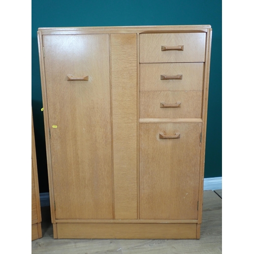 302 - An oak veneered Bedroom Cupboard/Chest and a Dressing Chest