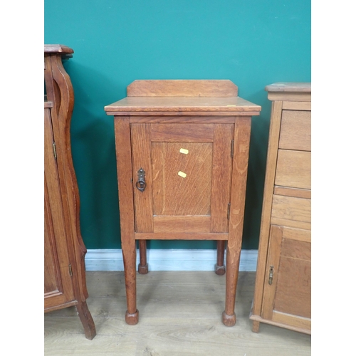 337 - Two oak Pot Cupboards and a Bedside Chest