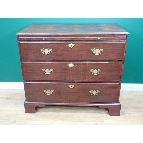 353 - A Georgian mahogany Chest with moulded top fitted three graduated drawers and bachelor's slide mount... 