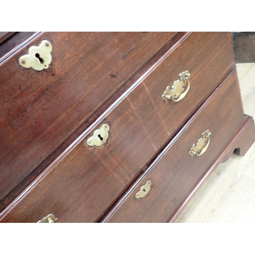 353 - A Georgian mahogany Chest with moulded top fitted three graduated drawers and bachelor's slide mount... 