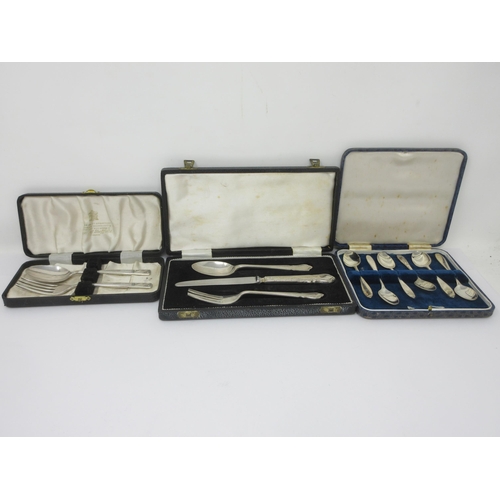 36 - Two silver Christening Sets and six Coffee Spoons, all cased