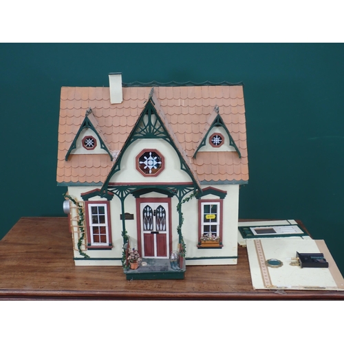 361 - A Doll's House Cottage with dolls, furniture and accessories