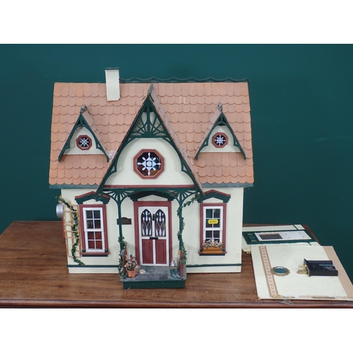 361 - A Doll's House Cottage with dolls, furniture and accessories