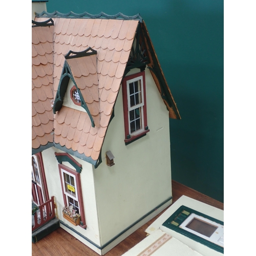 361 - A Doll's House Cottage with dolls, furniture and accessories