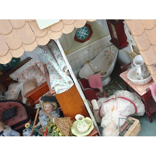 361 - A Doll's House Cottage with dolls, furniture and accessories