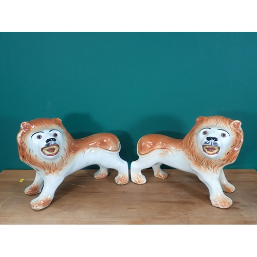 364 - A pair of large Staffordshire Lions