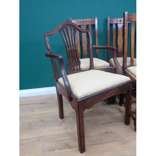 373 - A Georgian mahogany Elbow Chair and four oak Dining Chairs