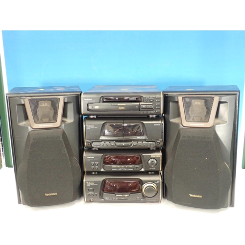 387 - A Technics Stereo Sound Processor, Stereo Tuner Amplifier, CD Changer, Cassette Deck and two Speaker... 