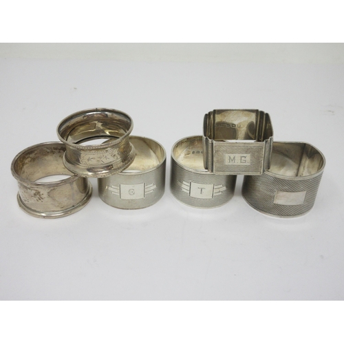 43 - A pair of George V silver heavy Napkin Rings, engraved G & T, Birmingham 1934, and four various silv... 