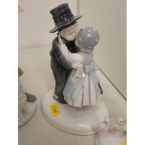 462 - Three Continental porcelain Figures in Victorian dress