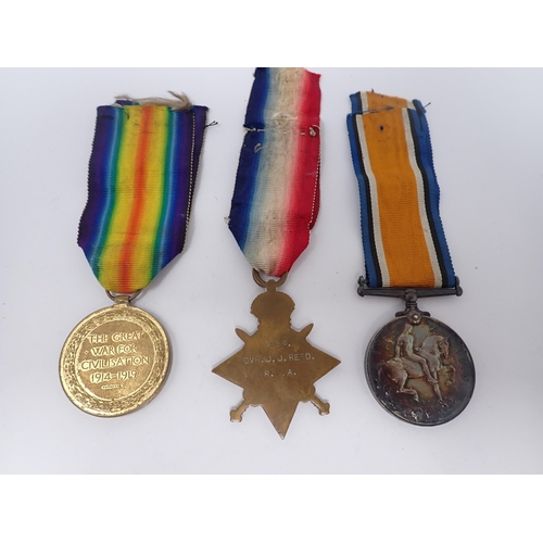 1523 - A trio of WWI Medals comprising 1914-15 Star, War and Victory Medals to 1854, PTE J.J. Reed, R.F.A.