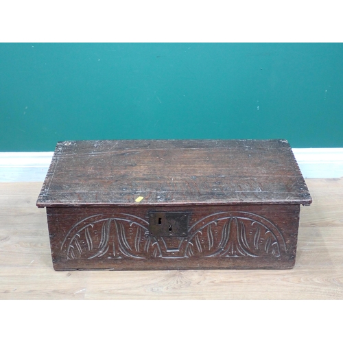 545 - A 17th Century oak boarded Box with chip carved edges and lunette carved front 2ft 3in W x 8in H