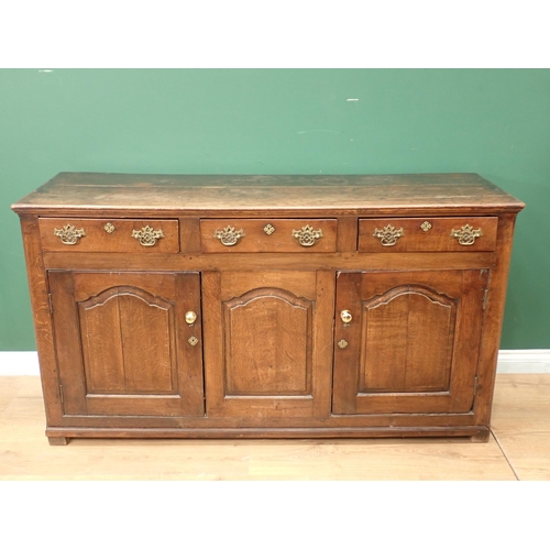 546 - An 18th Century oak Dresser Base fitted three frieze drawers above three fielded cupboard doors 5ft ... 