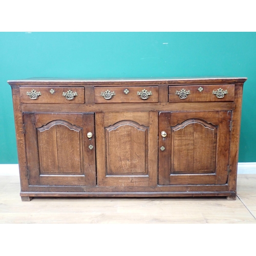 546 - An 18th Century oak Dresser Base fitted three frieze drawers above three fielded cupboard doors 5ft ... 