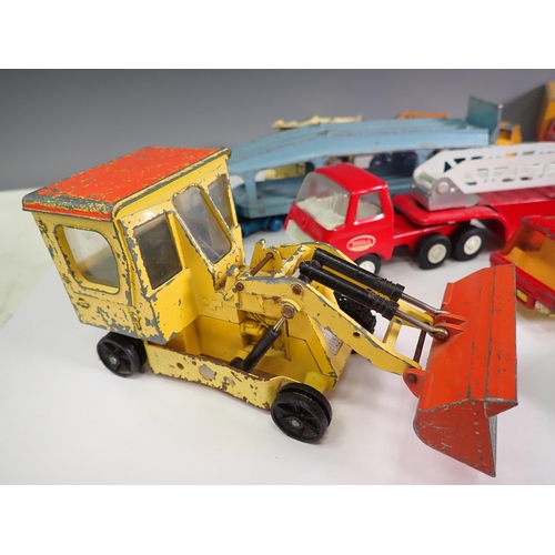 548 - A box of unboxed playworn Dinky Toys and other diecast Vehicles including Heinz Bedford Lorry