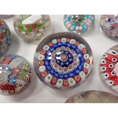 558 - Seventeen glass Paperweights and a Murano glass Swan