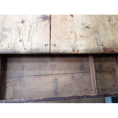 572 - A Victorian pine scrub top Kitchen Table on stained base with turned supports 4ft 7in W x 2ft 5in H