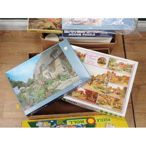 573 - A quantity of Jigsaw Puzzles