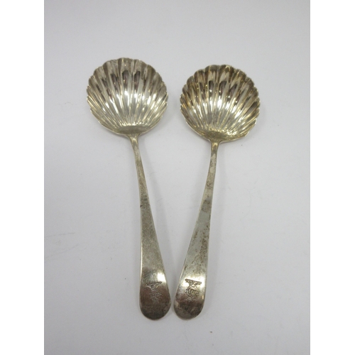 58 - A pair of George III silver Sauce Ladles with scallop bowls, engraved crests, London 1786, maker: Jo... 