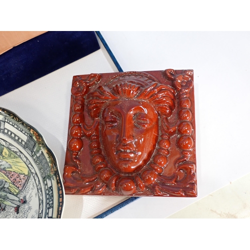 583 - A relief moulded Tile of a Pagan Goddess A/F, a Royal Doulton Queen Elizabeth Bowl and a relief moul... 