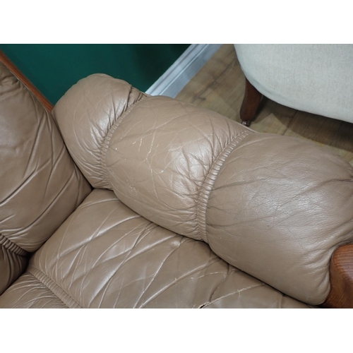 595 - An Ekorness brown leather upholstered Sofa 4ft 10in W x 2ft 5in H