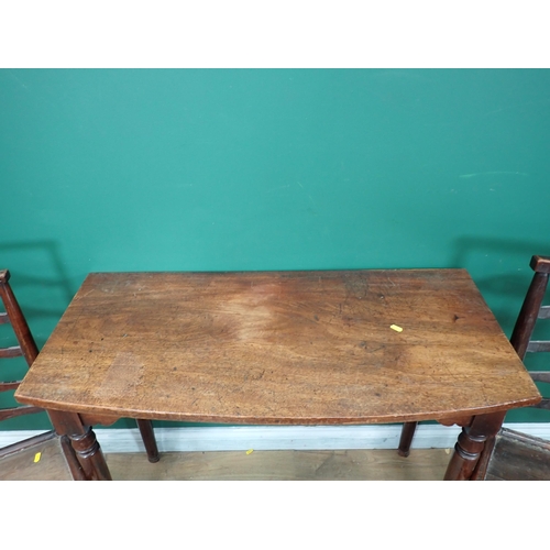 610 - A 19th Century mahogany bow fronted Side Table on turned supports 3ft 3in W x 2ft 6in H and three co... 