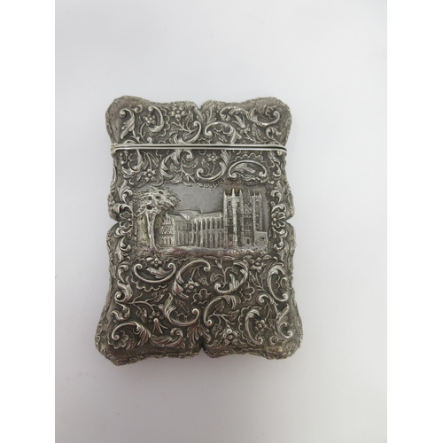 62 - A Victorian silver castle top Card Case decorated Windsor Castle, floral and leafage scroll surmount... 