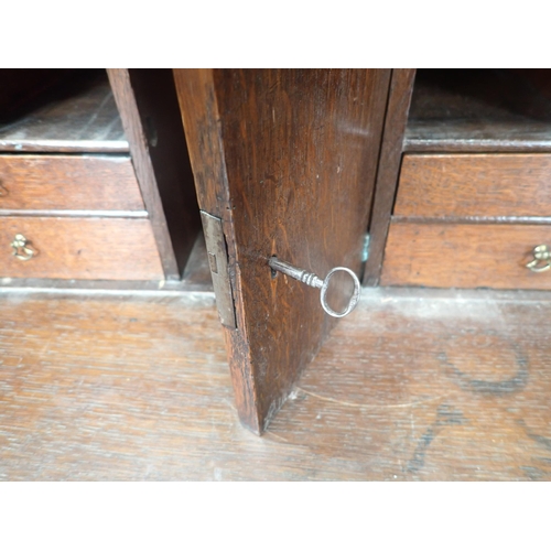 627 - A Georgian oak Bureau fitted four long graduated drawers mounted on ogee bracket feet 3ft 2in H x 2f... 