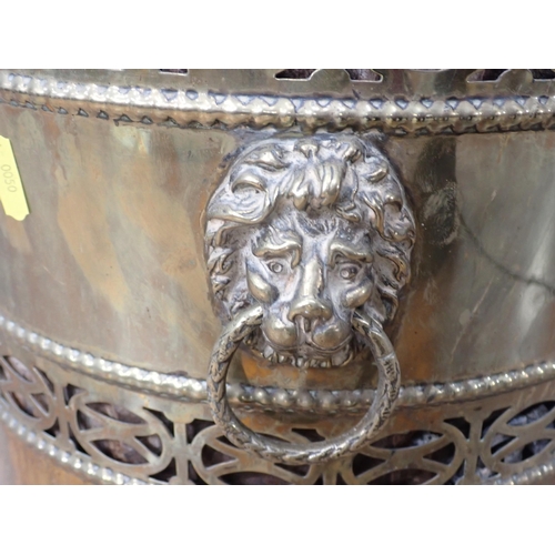 647 - A brass Coal Bin with lion mask ring handles, 19in H