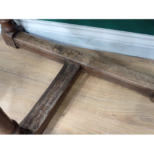 659 - A pair of oak Credence Tables with turned supports and squared stretchers, 2ft 11in W