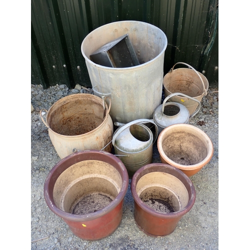 684 - Three garden Plant Pots, two Watering Cans, a galvanised Bucket, a metal Dustbin (no lid), etc