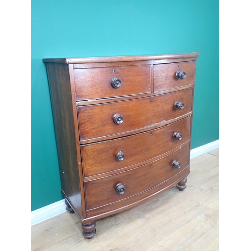 687 - A Victorian mahogany bowfront Chest of two short  and three long drawers on turned supports, 3ft 5in... 