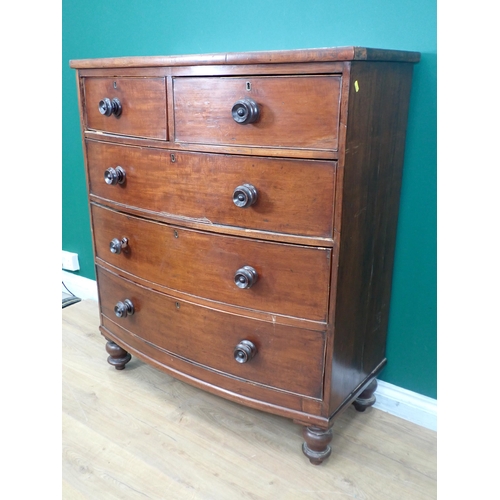 687 - A Victorian mahogany bowfront Chest of two short  and three long drawers on turned supports, 3ft 5in... 