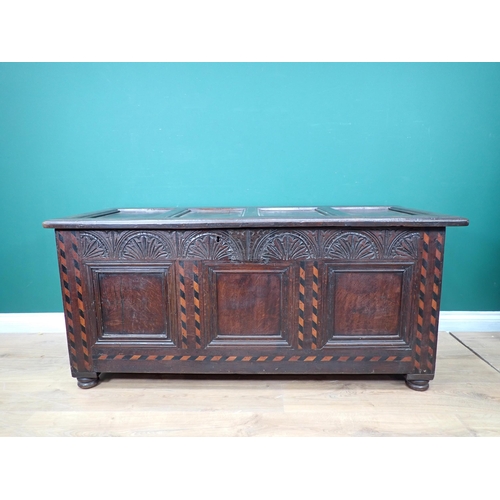 690 - A late 17th Century Halifax style Coffer with chequered inlay, carved frieze and panelled top on lat... 