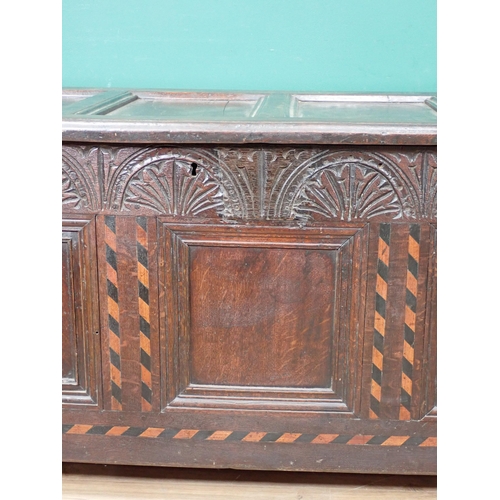 690 - A late 17th Century Halifax style Coffer with chequered inlay, carved frieze and panelled top on lat... 